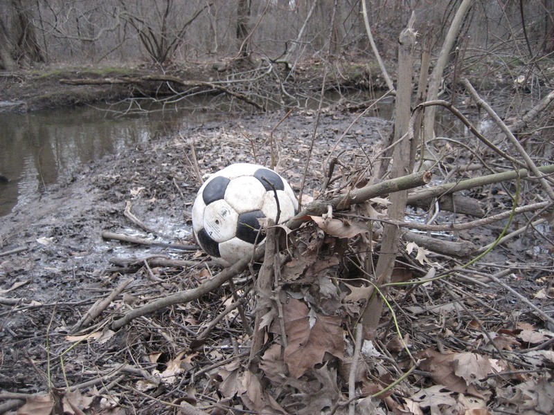 A lost soccer ball on the opposite side of the river from the confluence point (our attempt from the west).