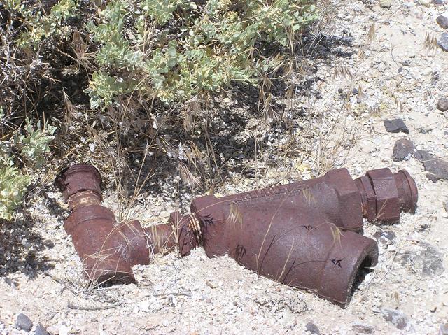 A rusted pipe fixture, just feet from the confluence point