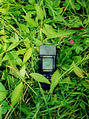#2: Shaken camera picture of GPS on ground at confluence