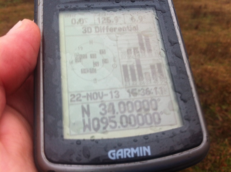 GPS receiver at confluence point.  I'm glad this unit is fairly waterproof.