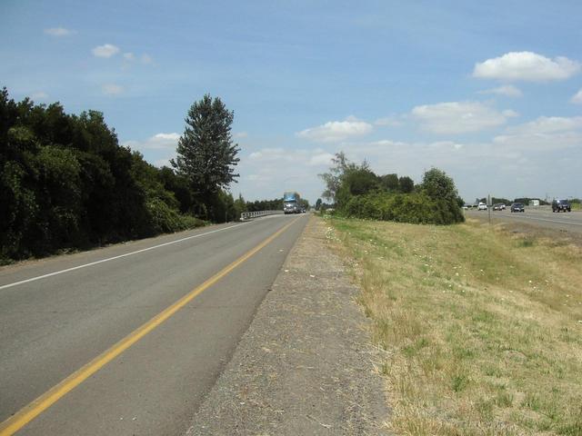 Confluence is to the left, directly in the path of that truck.  Looking  north.