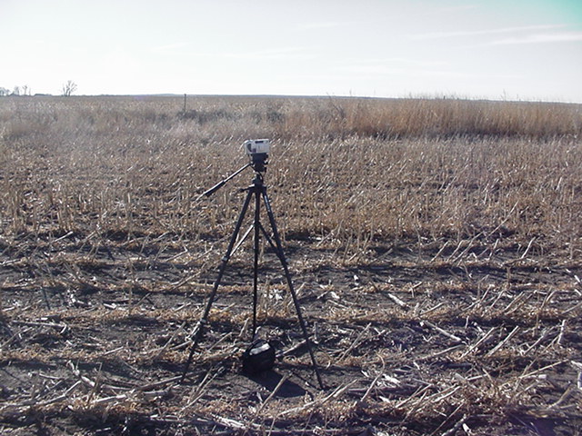 With a camera tripod at 44N-99W-A view looking South-fence line in the distance.