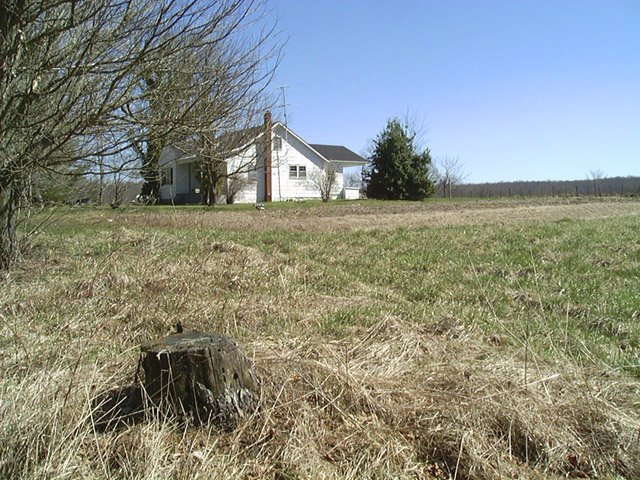 Looking NE at the house with the large field