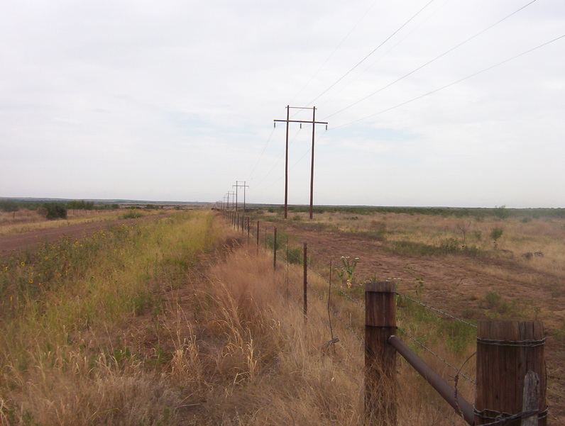 Power lines at dirt road