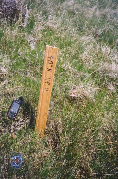 Oak stake showing lats & lons, GPS, and compass