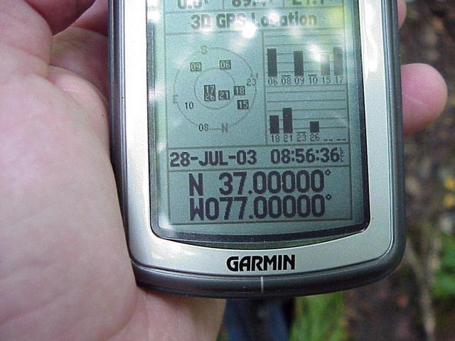 GPS receiver at the confluence after about 5 minutes of the confluence dance, to zero out the coordinates.
