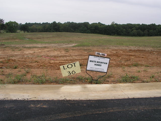 Parking at the curb of Lot 36 provides an easy approach to 38N 79W, located in the field below.
