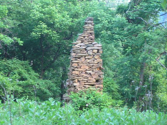 Nearest sign of humans to confluence--abandoned chimney 150 meters south of confluence.