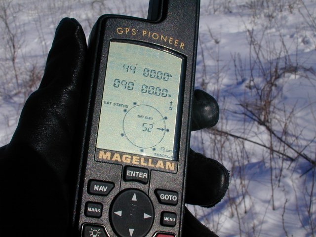 Close up shot of my trusty Magellan GPS Pioneer readout at the confluence point.