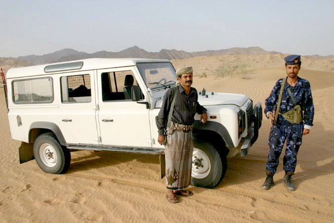 `Aliy Sālih and one of the policemen at the spot where we admitted defeat