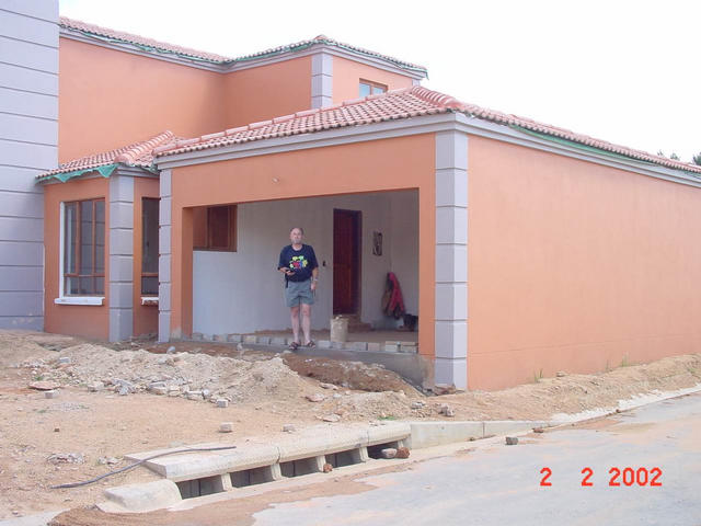Closer view of the garage, with Pete standing in the entrance.