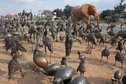 #7: Roadside metal sculptures by Zimbabwean refugees ranging from owls to elephant