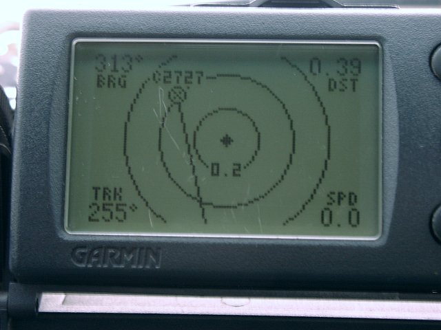 GPS screen showing Confluence position relative to trig beacon. The Confluence lies 390 m away at a bearing of 313 degrees.