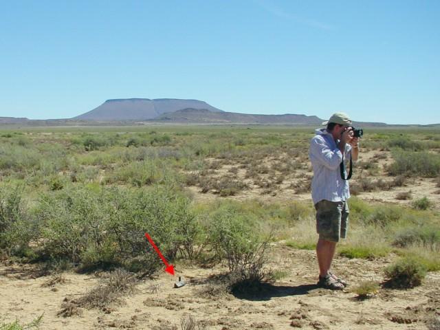 My brother Cecil, taking the shots for a panoramic 360°. The GPS is pointed out by the red arrow.