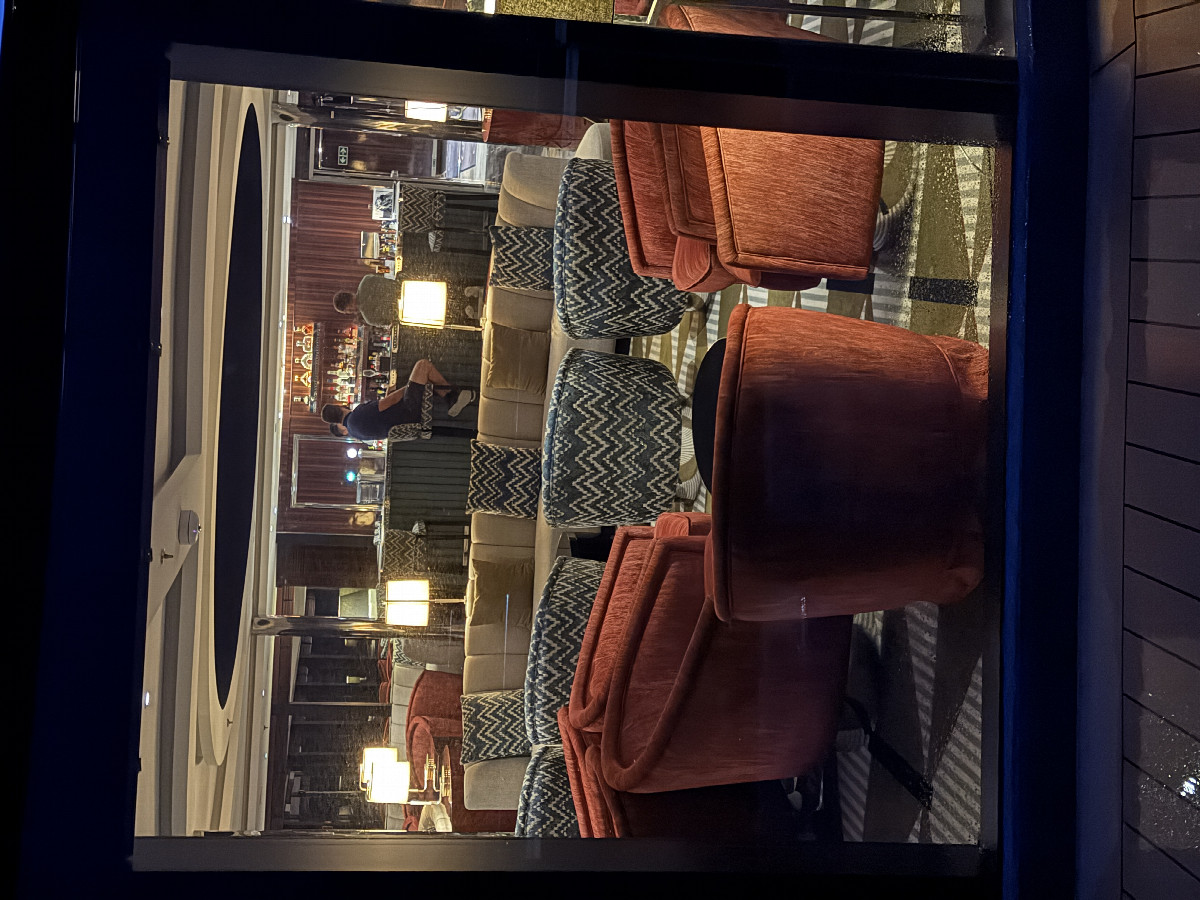 North back into ship’s lounge