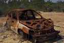 #7: A wrecked, burned-out car, near the confluence point