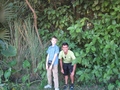 #8: Shuchak and Kevin standing at the row of trees