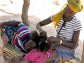 #9: Peul girls mending their hair