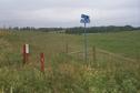 #8: The intersection of Range Road 10 and Township Road 352 and a pipeline warning sign found near confluence.
