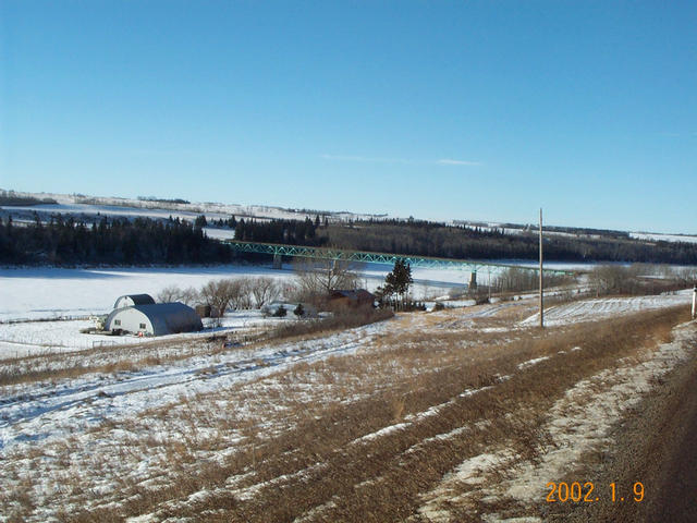 A farm and the North Saskatchewan River