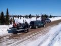 #6: Loading snowmobiles near the bridge at MishwopTurn on South Feeder, Paradise River, Labrador.