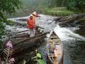 #8: Lining the Canoe over Kathleen Lake Dam