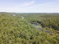 #9: View East from 90 m above the point