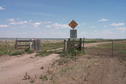 #7: Texas cattle gate at entrances to pasture. Old Wives Lake seen on left in background.