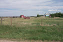 #8: A typical Saskatchewan farm ... this one just one kilometer east of the confluence.