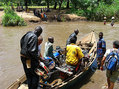 #9: Crossing the Kakoyi river on a canoe