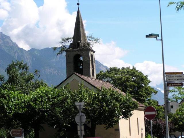 Trees are growing on a church tower at Martigny
