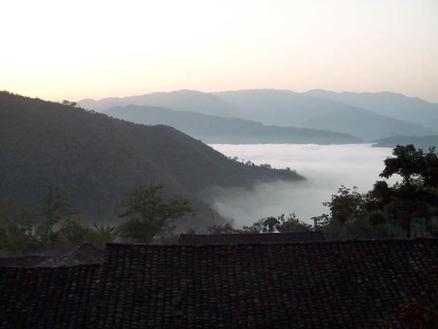 Sea of clouds morning view from farmhouse.