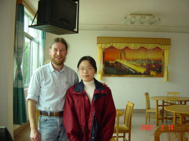 Jiang Cuiwen ("Man"), and a rather dishevelled me, in the restaurant in Jiangkou