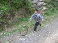 #3: Boy on the way to school in Lóngtángbà.