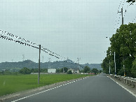 #8: The peaceful countryside and the newly paved asphalt road.