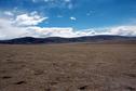 #4: At the confluence, looking west.  Nam-tso is to the left and behind the hills.