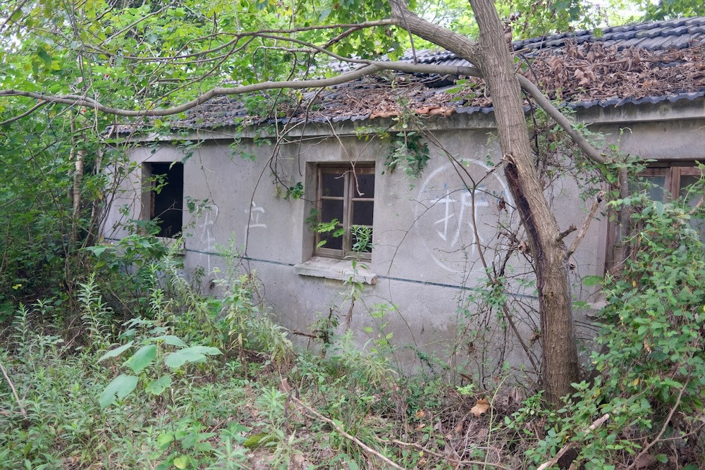 One of the abandoned buildings along the &ldquo;combat readiness channel&rdquo;.