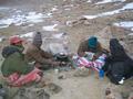 #6: Buju, Sola, Taishi, Robert (left to right) shivering and making tsampa at U-valley cold campsite.