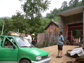 #3: Our taxi and driver in Dàzhuāng Village, attracting some curious locals