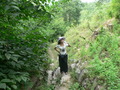 #5: Ah Feng pauses for a sip of water on the path up into the hills