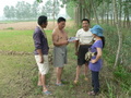 #10: Ah Feng with (L to R) Zuǒ Qíjūn, another local from across the ditch, and our motorcyclist