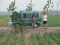 #3: Ah Feng with our minivan and driver, on the track 155 m south of the confluence