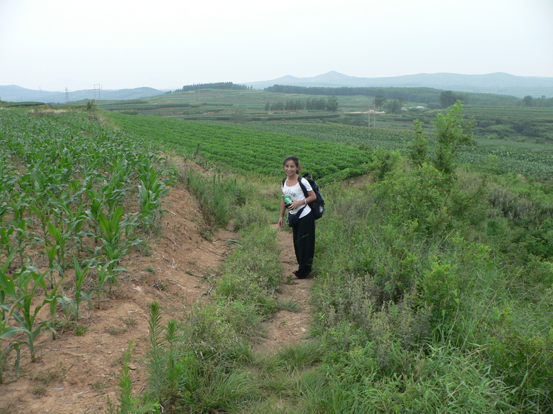 Ah Feng next to the confluence, in the uncultivated land on the right