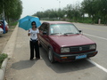 #5: Ah Feng beside our air-conditioned taxi