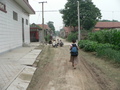 #3: Ah Feng walking through the residential area