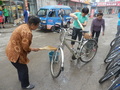 #9: Women cleaning my bicycle
