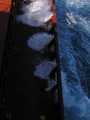 #7: Breakers splashing on the ship's main deck