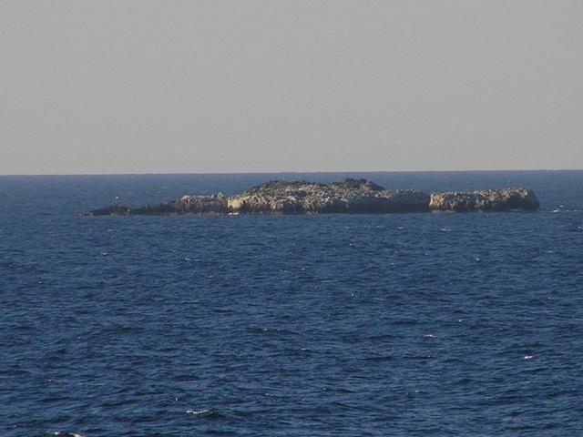 A small islet northeast of Cape Andreas