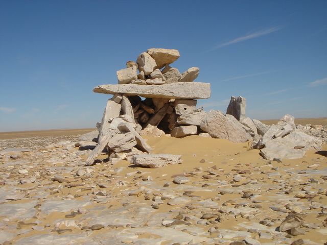 The "Great Cairn" at the branch point in the camel caravan trails, mounds of pottery similar to what we had found the previous day were close by