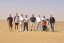 #7: The group standing around the point with the camel bones at their feet.